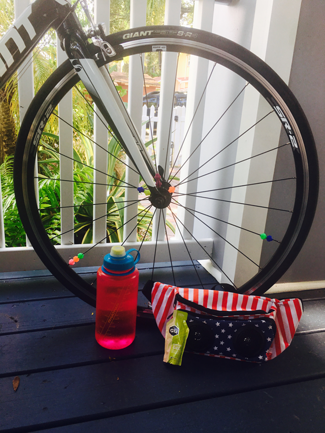When preparing for a long ride, make sure you pack the essentials: Water, energy gel, fanny pack, spokey dokes. - Resie Waechter