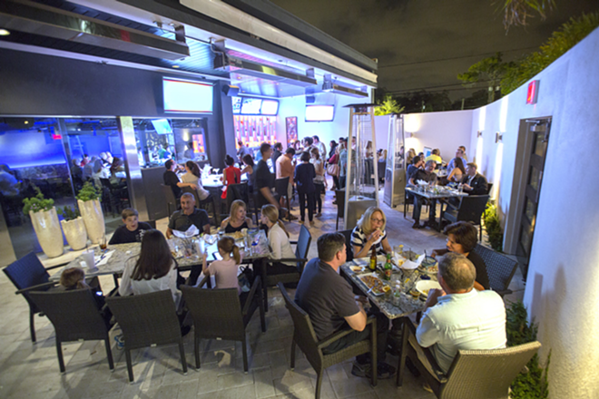 The restaurant's patio bar is splendidly designed like the rest of its space. - Chip Weiner