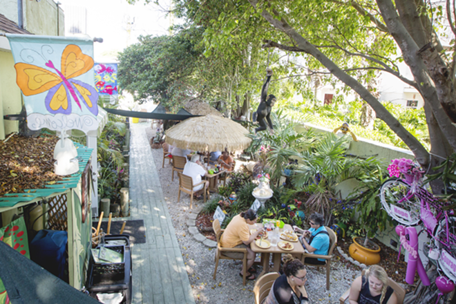 Diners chow down in the restaurant's dog-friendly Garden of Eatin'. - Chip Weiner