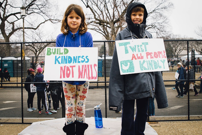 At marches across the country, including the main DC one, protesters brought their kids. - Anthony Martino