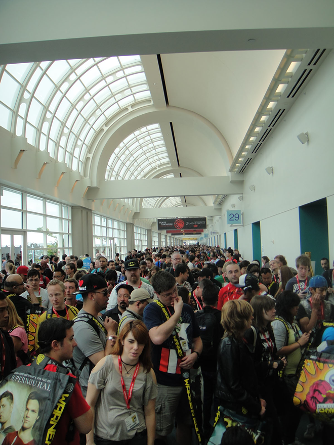 Thousands of fans wait for the exhibition hall to open in 2011 at San Diego Comic Con. - PopCultureGeek.com via Wikimedia Commons/CC