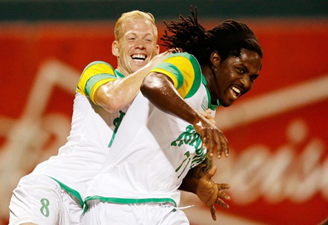 Midfielder Luke Mulholland (left) and forward Lucky Mkosana (right) celebrates Rowdies' 2-1 victory over Fort Lauderdale Strikers on Saturday night. - Tampa Bay Rowdies