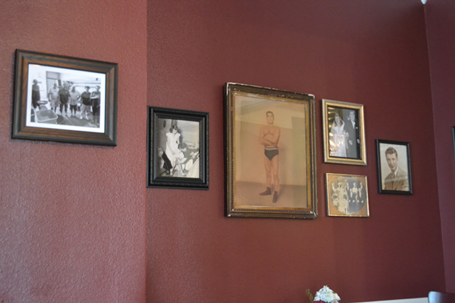 Old photos of founder Bob Sylvester and wife Anne's relatives line one wall. - Ryan Ballogg