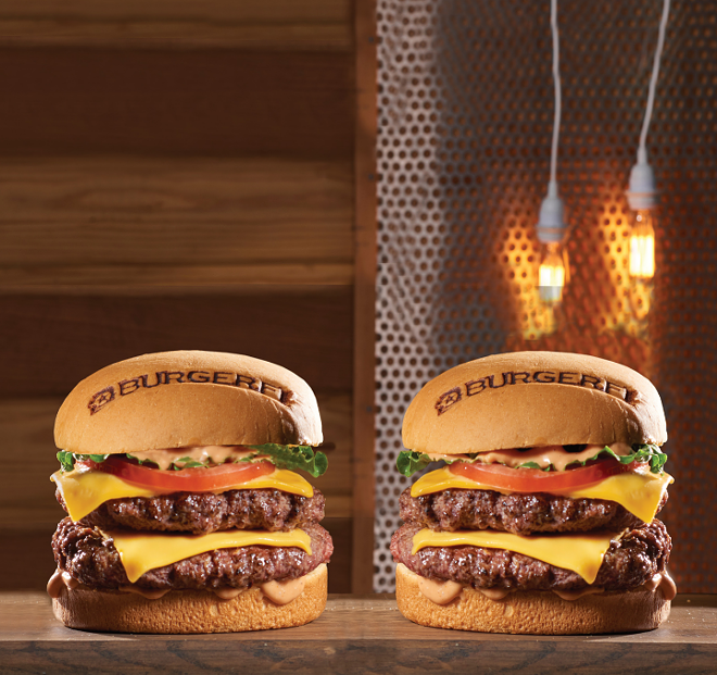 BurgerFi's cheeseburger is stacked with two Angus beef patties, meaning double American cheese. - BurgerFi