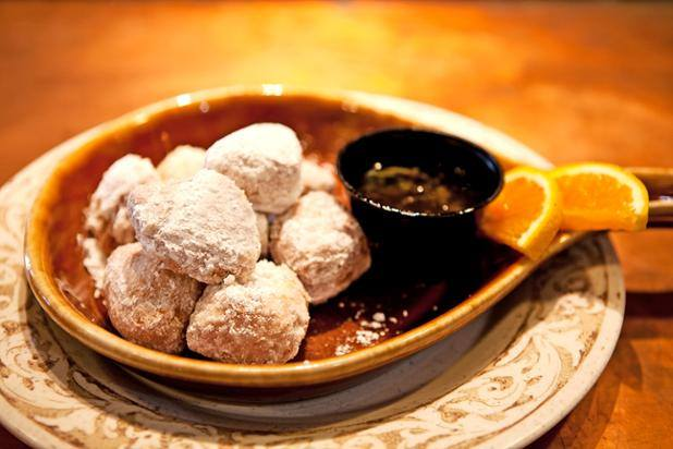 Biscuit beignets are one of Another Broke Egg Cafe's New Orleans-style dishes. - Another Broken Egg Cafe (Clearwater, FL) via Facebook