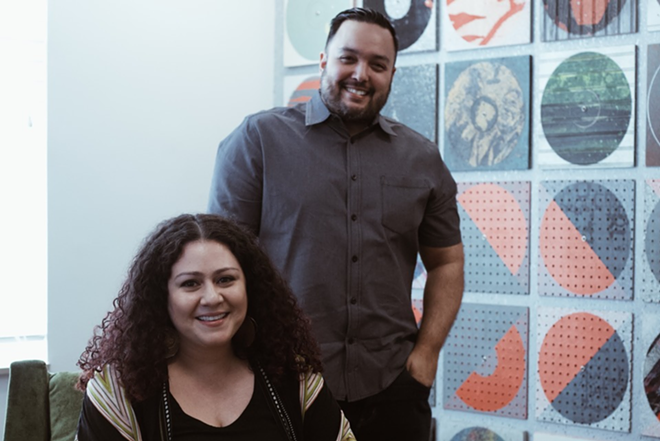 Janette Berrios (L) and Jorge Brea pictured at Symphonic Distribution’s headquarters in Tampa, Florida on March 30, 2018. - Photo by Michael Johnson