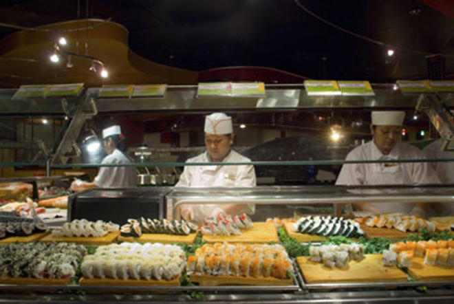 TROUGH GOING: The all-you-can-eat sushi bar is Crazy Buffet's crowning glory. - Lisa Mauriello