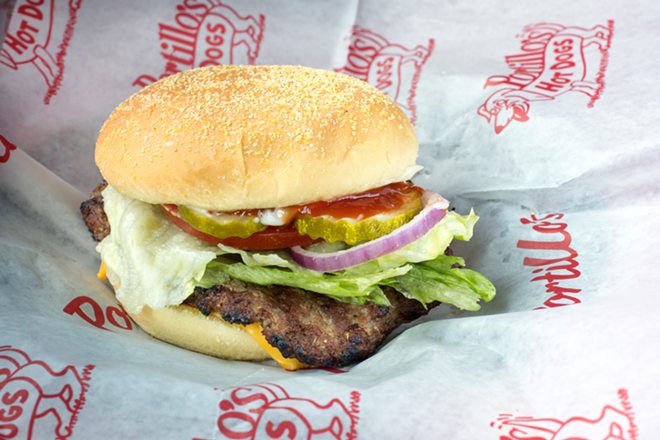 The char-broiled burger with cheese showcases toppings like crisp lettuce, red onion and pickles. - Chip Weiner