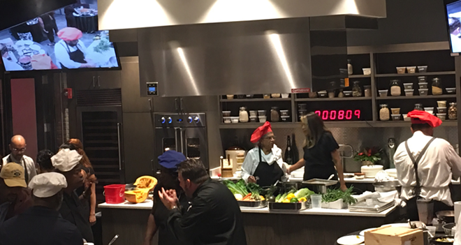 Bay area chefs coaching three teams of four through Friday's culinary competition at the Epicurean. - Shelbi Hayes