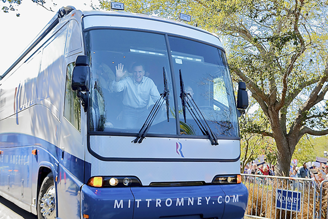 MOVE THAT BUS! The Mitt brigade rolled into Dunedin for a big rally the day before the primary. - Kevin Tighe