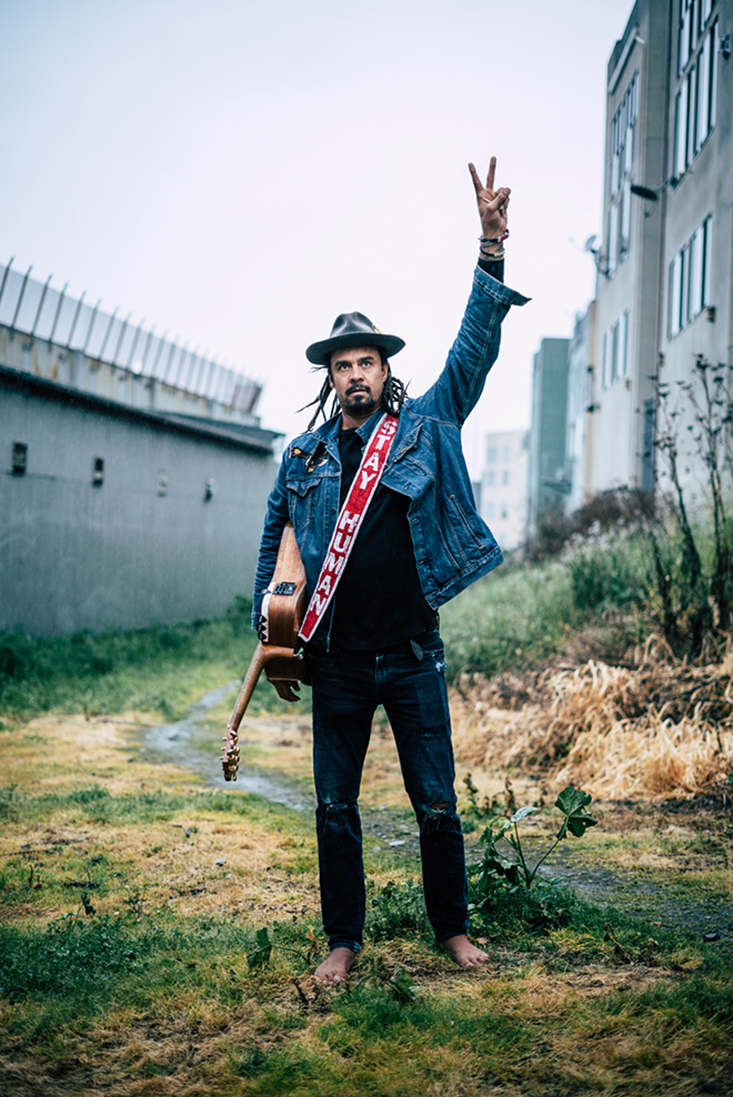 BURNING MAN: Michael Franti, who brings two fiery sets to St. Petersburg this week. - Anthony Thoen
