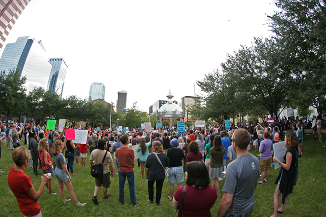 Activists gathered in downtown Tampa Sunday night to express solidarity with anti-white supremacist protesters in Charlottesville. - Kimberly DeFalco