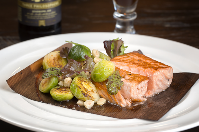 ONE FISH: Élevage’s cedar plank salmon with Brussels sprouts, hazelnuts and apple Lambic fruit beer glaze. - Chip Weiner