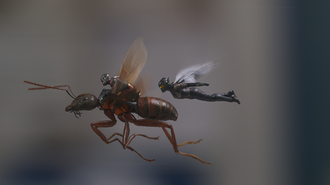 Ant-Man (Paul Rudd), left, and The Wasp (Evangeline Lilly) fly into action to try and save a loved one trapped inside the Quantum Realm. - Marvel Studios