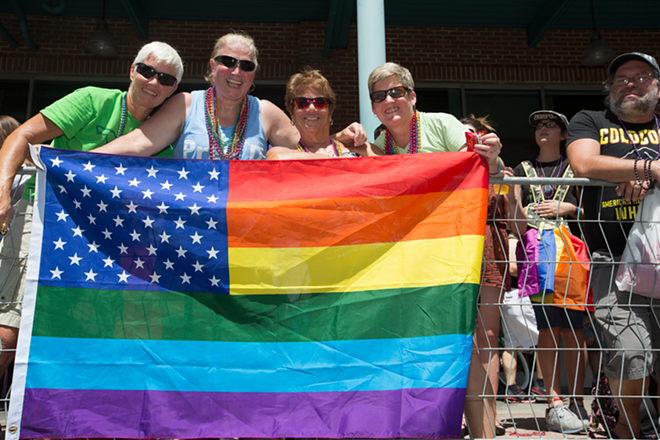 Noreen Miller, Nancy Bolton, Angela Melito and Sharon Bordwine show their American and Gay pride. - Chip Weiner
