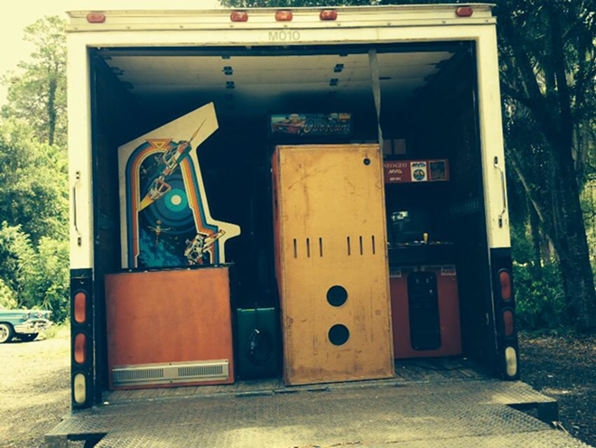 One load of the dozens of classic games being packed into the Tarpon Springs space. - Replay Amusement Museum