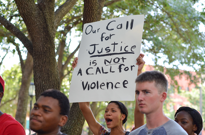 Demonstrators demanded for justice, not violence during the Black Lives Matter rally in Tampa Monday. - Zebrina Edgerton-Maloy