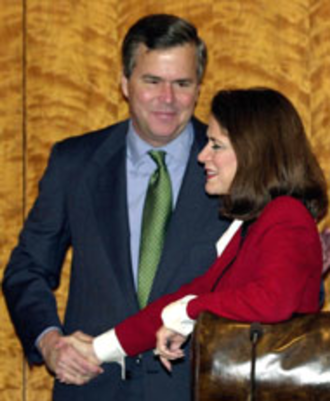 PRIMAL PURGE: Jeb Bush with Katherine Harris, - Florida Secretary of State and co-chair of his - brother's Florida presidential campaign in - November 2000. - AGENCE FRANCE PRESSE
