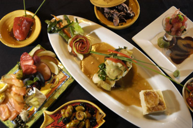 SURROUNDED: A nightly special of seabass (center), accompanied by a selection of The Pearl's tasty tapas. - Lori Ballard