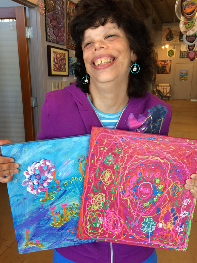 Gina K. shows two of her paintings - Jody Bikoff