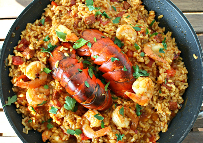 LE GUSTA: Seafood paella can be eaten right from the pan. - Katie Machol Simon