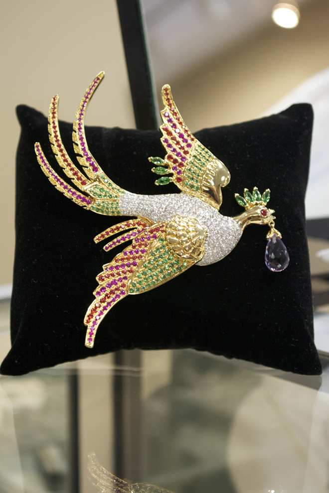 THE CROWN JEWEL: Baubles & Bubbles’ 14-karat gold bird pin with two carats of white diamonds in the body. - Leslie Joy Ickowitz