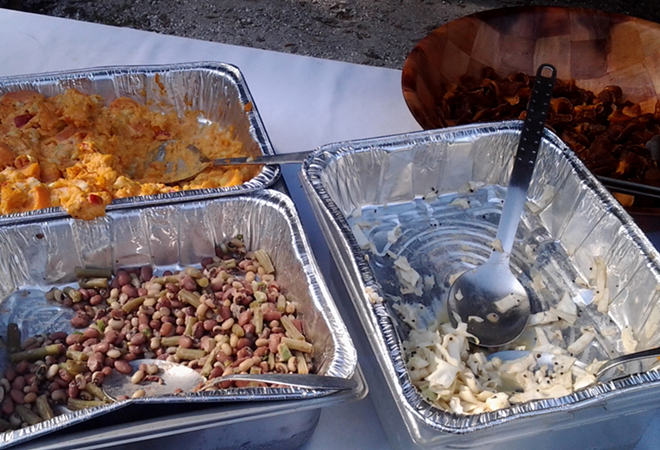 A few disheveled side dishes. Co-owner Curtis Beebe said diners arrived to Swinefest at 2 p.m., right as the event kicked off. - Meaghan Habuda
