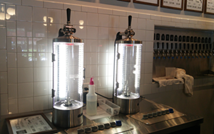 The "spaceships," or growler-filling machines. - Meaghan Habuda