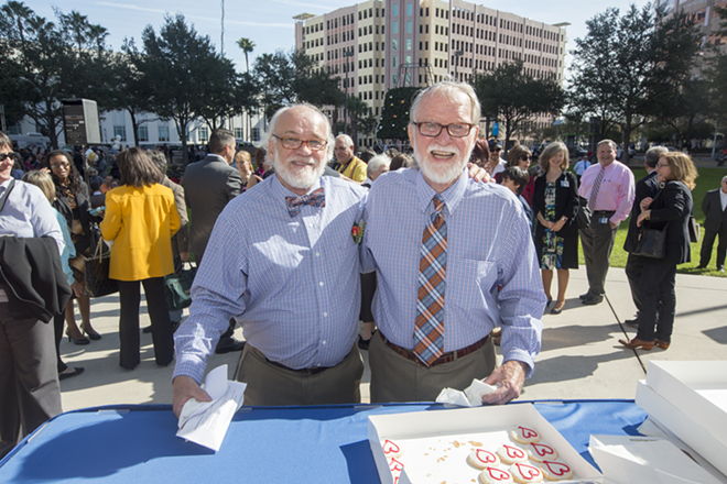 Bud Parsons and Darrell Walker turned in their marriage license application at the special clerk's table set up in Chillura park. They have been together 35  years, and this was their first formal bonding ceremony. - Chip Weiner
