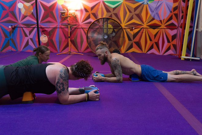 Yoga instructor, Aaron Tremper, teaching a mobility class at The Movement Sanctuary. - Jennifer Ring
