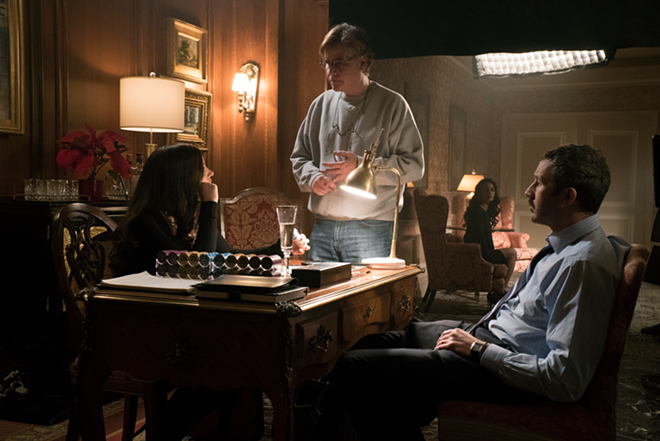 Aaron Sorkin, center, directs Jessica Chastain and Chris O'Dowd in a scene from Molly's Game. - STXfilms