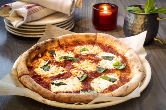 Accompanied by an elderflower mule, the margherita pizza is picture-perfect with a notable char. - CHIP WEINER