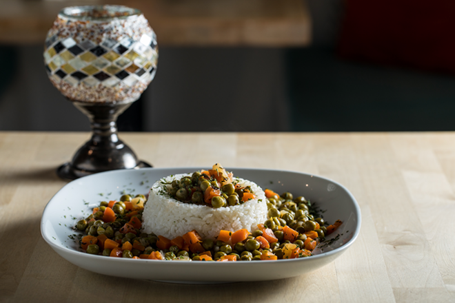 The peas’ special with rice pilaf isn't tasteless; it just holds little allure without some link to a fond memory. - Photo by James Ostrand