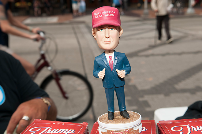 A Donald Trump Bobblehead doll on sale in the street outside Quicken Loans Arena. They were being sold for $20 and they have sold out each of the last two days. Jesse, who was selling the dolls, is a Trump supporter. "He is gonna bring jobs back here. They send our jobs overseas and the profits go overseas." When asked where the bobbleheads she sells were made, she said the United States — but upon closer inspection realized they were made in China. - Joeff Davis