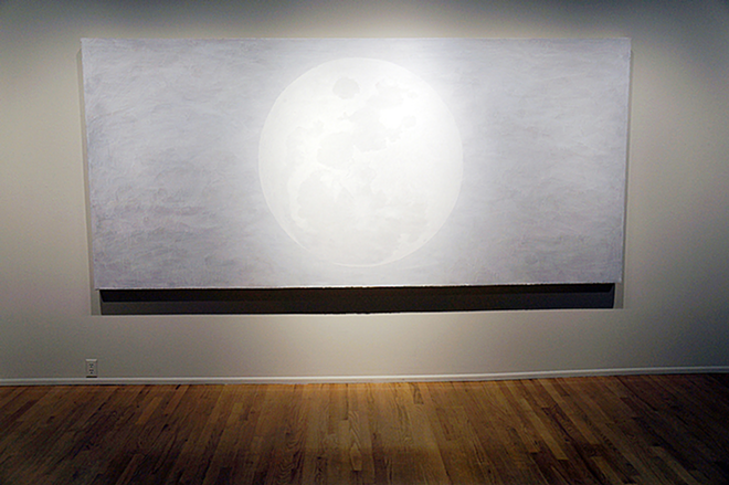 MOON SHINE: One of the two Selby canvases is a 12-foot-long, 5-foot-tall white-on-white painting of the moon. The finished orb hangs on the canvas uncannily like the actual moon. - MICKETT/STACKHOUSE