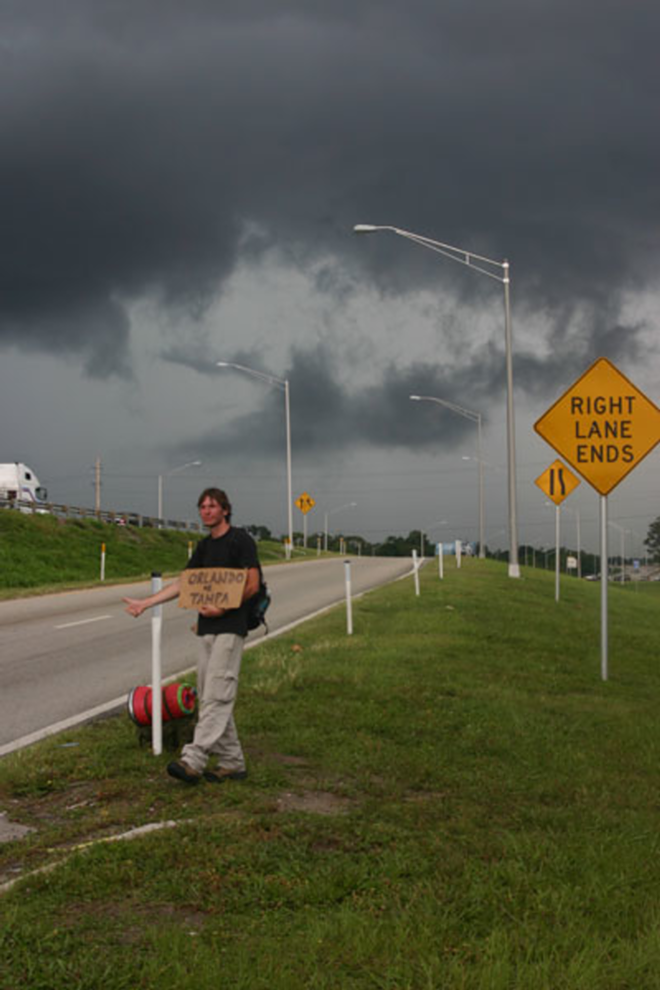 STORM WATCH: Clouds roll in as the author attempts to score a free ride off I-4. - ETHAN CLARKSON