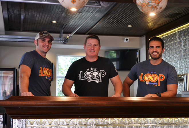 In the Loop Brewing owners Mark Pizzurro, Joe Traina and Peter Abreut behind their tasting room's punched tin and custom concrete bar. - Ryan Ballogg