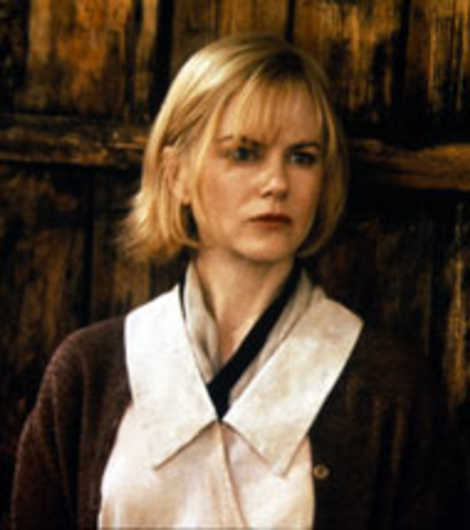 GRACE UNDER PRESSURE: Nicole Kidman plays - Grace, a fugitive preyed upon good honest folks" - of Dogville when she seek refuge there. - ROLF KONOW