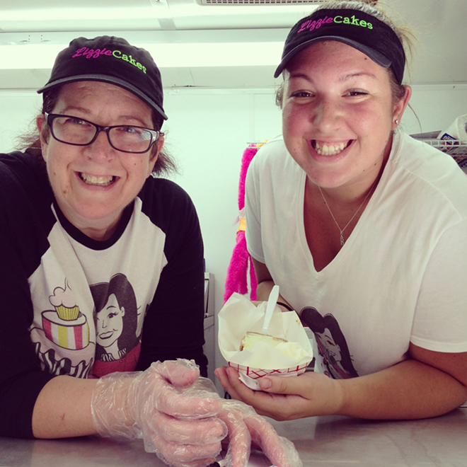 "Lizzie Cakes" owner Liz McComas (left) with a slice of her white chocolate key lime pie. - Arielle Stevenson