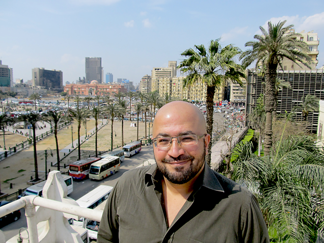 “PEOPLE DON’T SEE A WAY OUT”: Journalist Ashraf Khalil in Cairo. - Courtesy of American University in Cairo Press