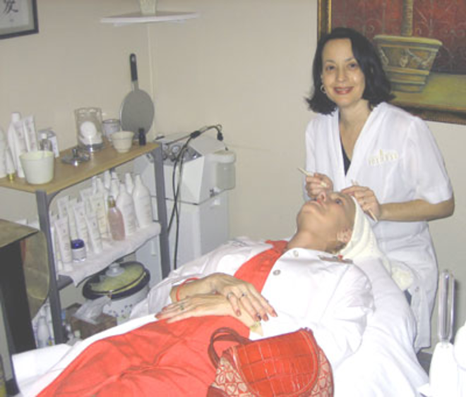 ISLAND ESCAPE: Esthetician Cathy Tunick-Cabeche performs waxing services on Davis Islands resident Pam Taven at DI Body & Boutique. - Rachel Moran