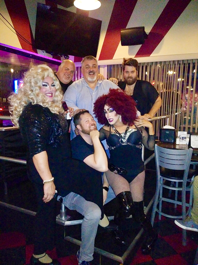 Comedians and drag queens come together each month thanks to 'Wigs & Wit' creator Jeff Klein (bottom row, center). - Jeff Klein