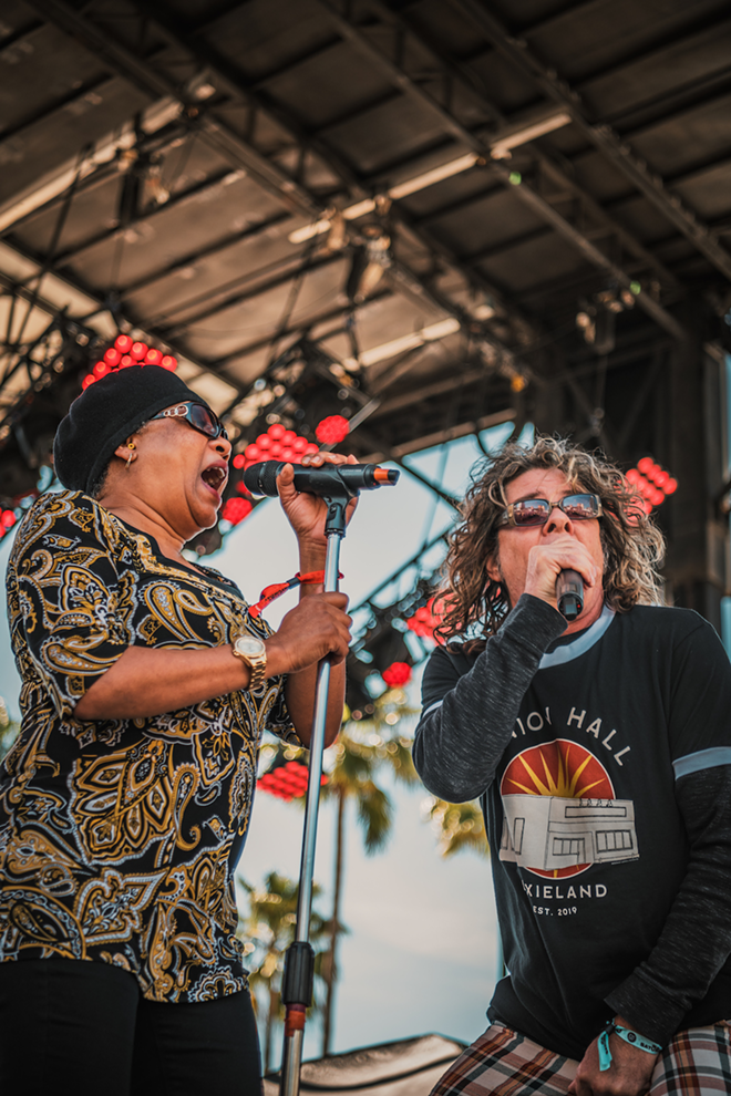 The Black Honkeys Band's Nicole Simone (L) and Phil Esposito playing Gasparilla Music Festival in downtown Tampa, Florida in March 2020. - Chandler Culotta c/o Gasparilla Music Festival