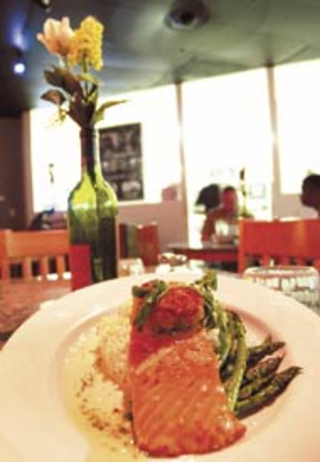 POST-BROWSING BITE: After scanning the racks, give the blue crab encrusted salmon a spin. - VALERIE TROYANO