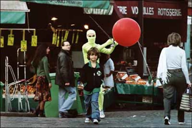 THAT INFLATABLE OBJECT OF DESIRE: Simon (Simon Iteanu) and his colorful inanimate friend in Flight of the Red Balloon. - Ifc First Take