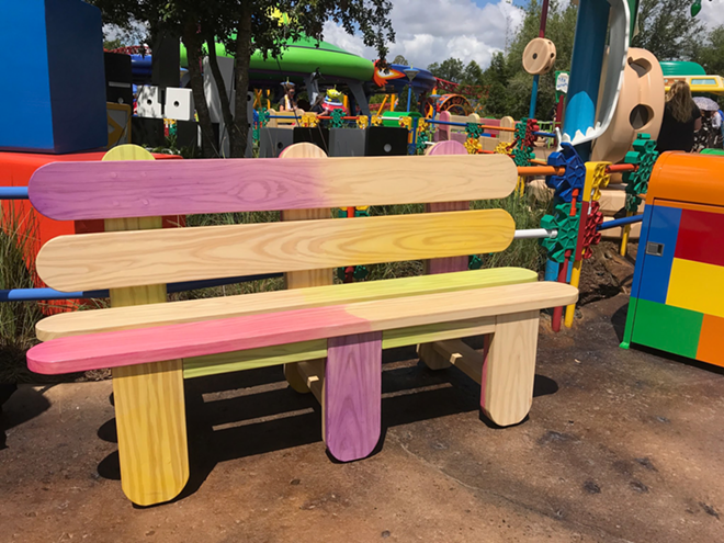 Toy Story Land's benches, made from used wooden pop sticks, are cutest seats we've ever seen. - Courtesy of Chelsea Tatham