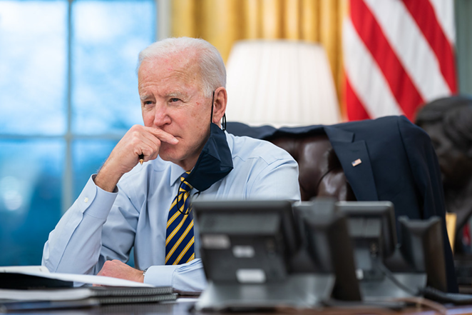 President Joe Biden participates in a conference phone call with governors affected by a snowstorm in the Midwest and southwest Tuesday, Feb. 16, 2021, in the Oval Office of the White House. - Official White House Photo by Lawrence Jackson