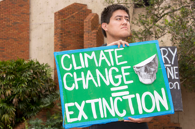 A climate change demonstrator in Tampa, Florida in April 2019.