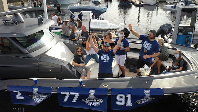 Steven Stamkos hoists the Stanley Cup during the Tampa Bay Lightning's boat parade on Sept, 30, 2020. - Nicole Abbett