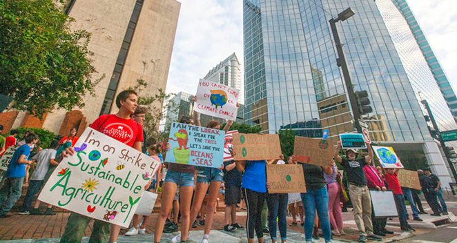 Climate activists participate in the 2019 climate strike near Tampa city hall - Kimberly DeFalco